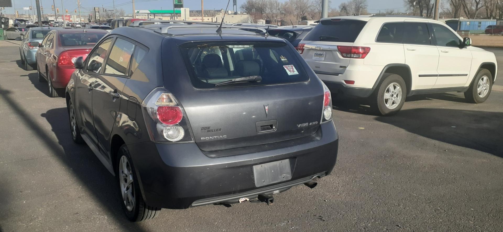 2010 Pontiac Vibe AWD (5Y2SM6E01AZ) with an 2.4L L4 DOHC 16V engine, 4-Speed Automatic transmission, located at 2015 Cambell Street, Rapid City, SD, 57701, (605) 342-8326, 44.066433, -103.191772 - CARFAX AVAILABLE - Photo#3